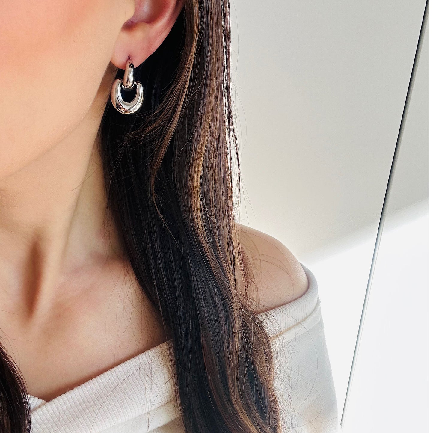Aretes Q Plateados